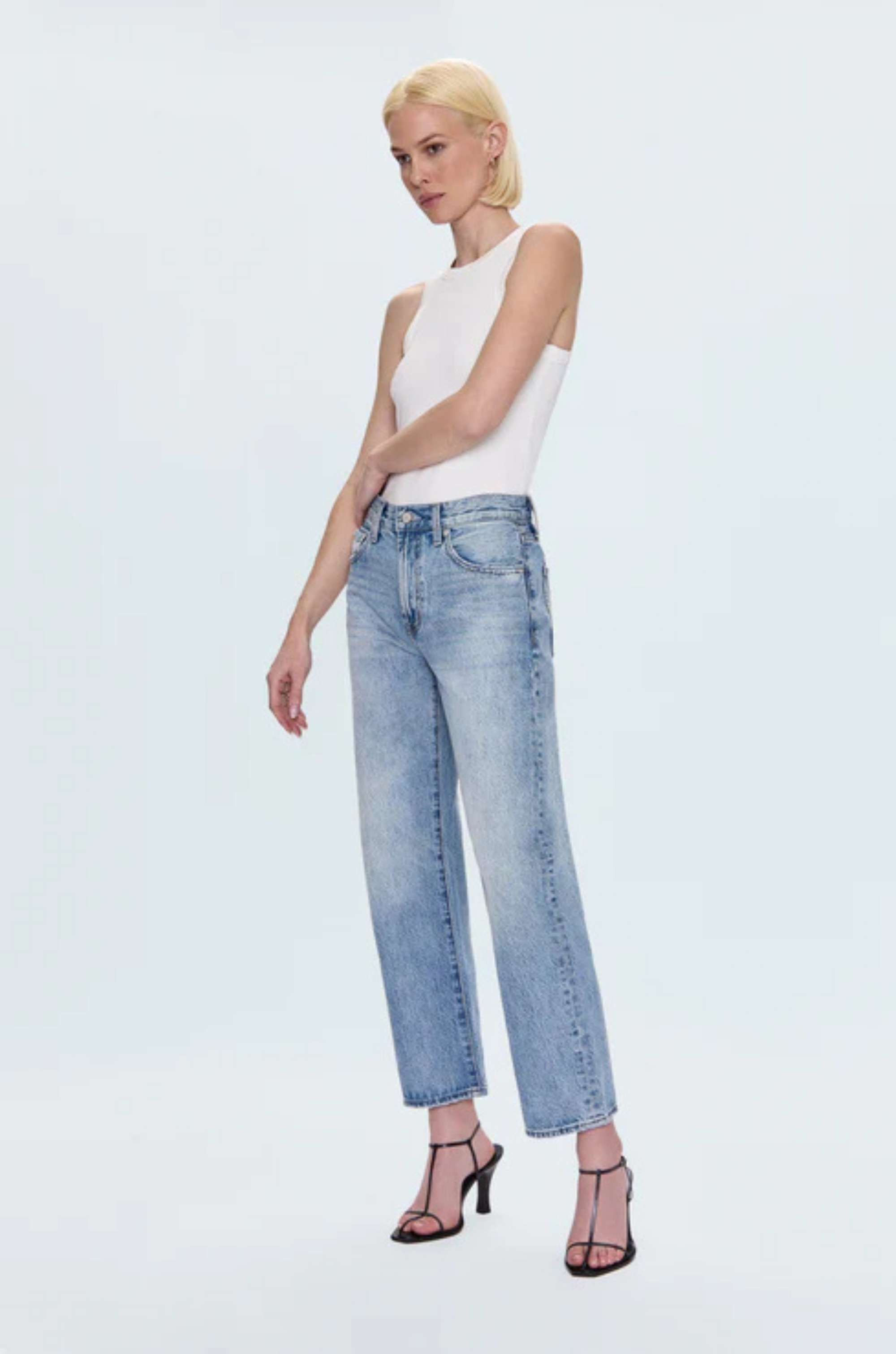 Faded straight leg jeans
Mid rise bowed straight leg jeans
No stretch
Button and zipper fly
Five pocket construction
Rise: 10" / Inseam: 29" / Leg Opening: 17.5"
Cotton
mid to light wash denim jeans