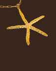 18K Gold Non-Tarnish Statement Starfish Necklace
18K Gold Plated
Stainless Steel
Pendant Size: 1.39" / Chain Length: 30.3" / Extension Length: 2"
Lead-free
Nickel-safe
Hypoallergenic
Water Resistant
Gold starfish necklace