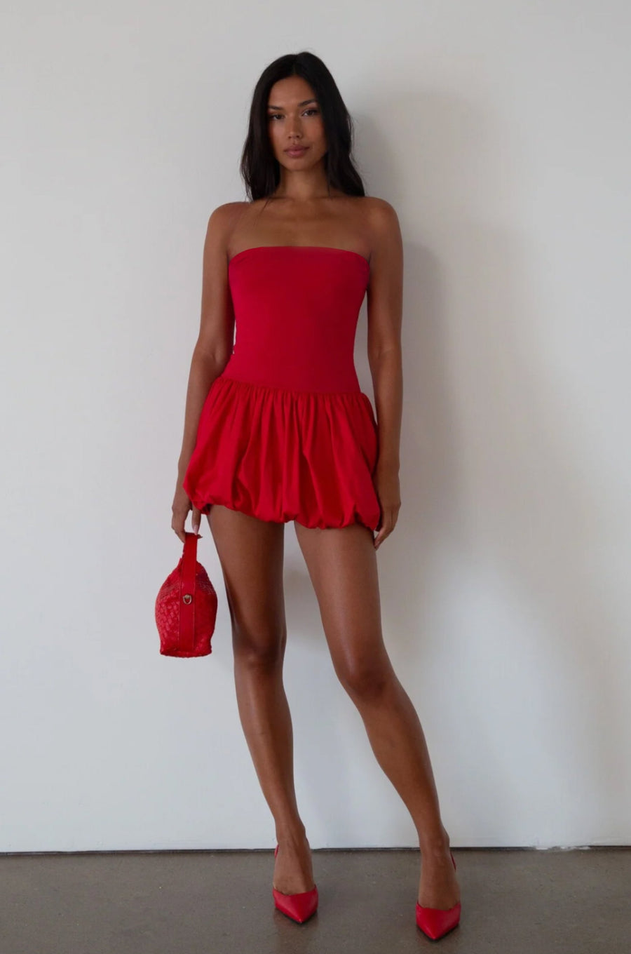 Sleeveless dress. Knit bodice. Woven bubble skirt. Elastic hem. Fully lined. red bubble dress. red mini dress. red mini bubble dress. summer dress. going out dress