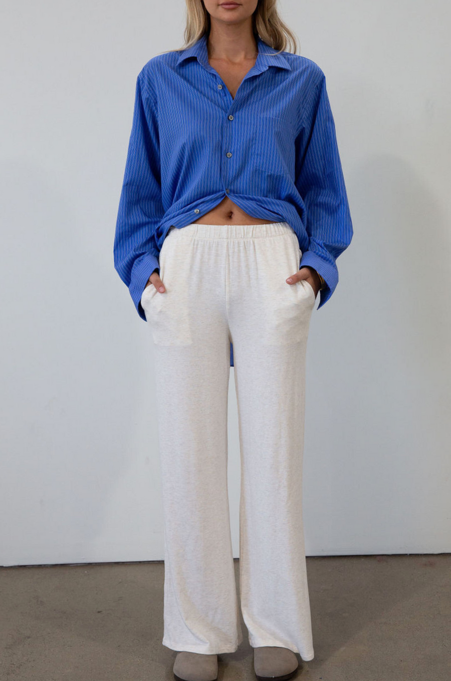 Ribbed knit pants. Elastic waistband. Side pockets. Unlined. causal pant. fall pant. cream casual pant
