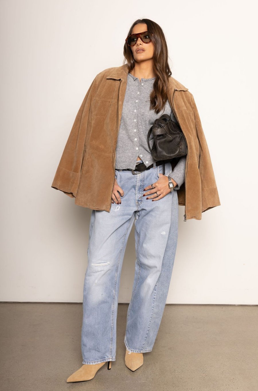 Knit long sleeve cardigan
Rolled collar
Button down closure
Unlined
grey knit cardigan
fall cardigan
thanksgiving outfit