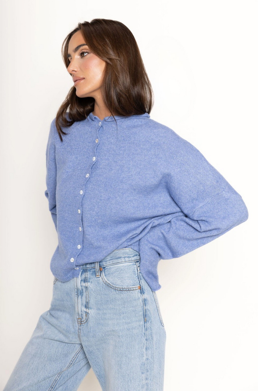 Fuzzy knit cardigan
Crewneck
Front button down closures
Long sleeves
Unlined
blue cardigan