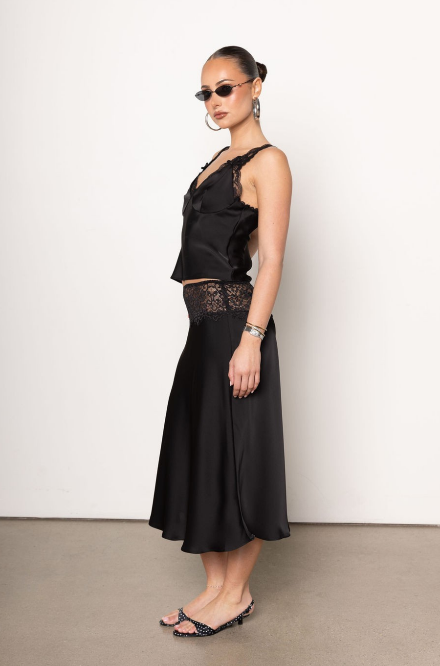 black Satin tank top
Lace trim and straps
V-neckline
Bow details
Unlined
fall top
fall tank top
fall outfit