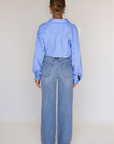 High rise light wash denim jeans
Relaxed/ wide leg silhouette
Clean finished hem
Crafted with comfort stretch denim
medium wash high rise jeans