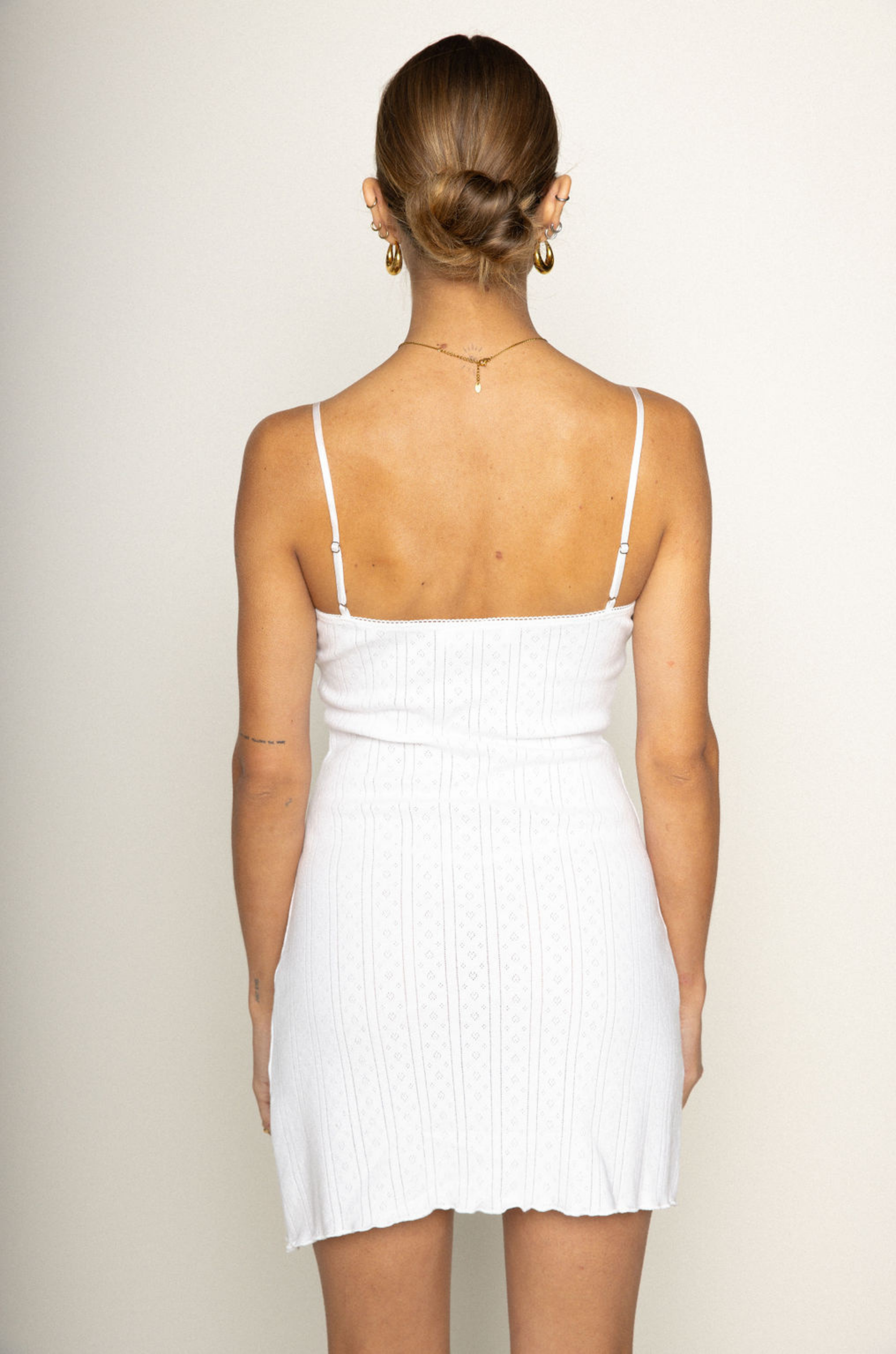 white Knit eyelet pointelle mini dress
Slip cami dress
Adjustable straps
Little bow detail
Unlined/partially sheer
summer mini dress
spring mini dress
coquette mini dress