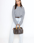 Fuzzy knit cardigan
Crewneck
Front button down closures
Long sleeves
Unlined
grey cardigan