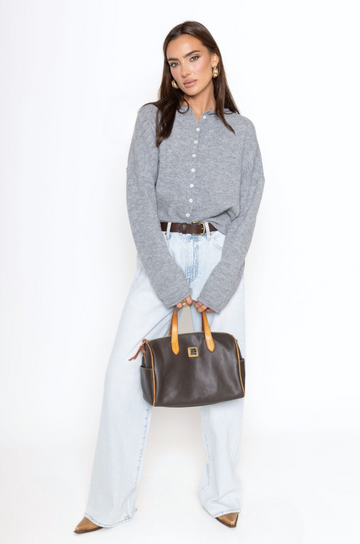 Fuzzy knit cardigan
Crewneck
Front button down closures
Long sleeves
Unlined
grey cardigan
