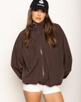 Windbreaker long sleeve jacket
Zip up closure
Rollable hood with zip closure
Adjustable drawstring hem and sleeve hem
Brown windbreaker jacket
fall outfit