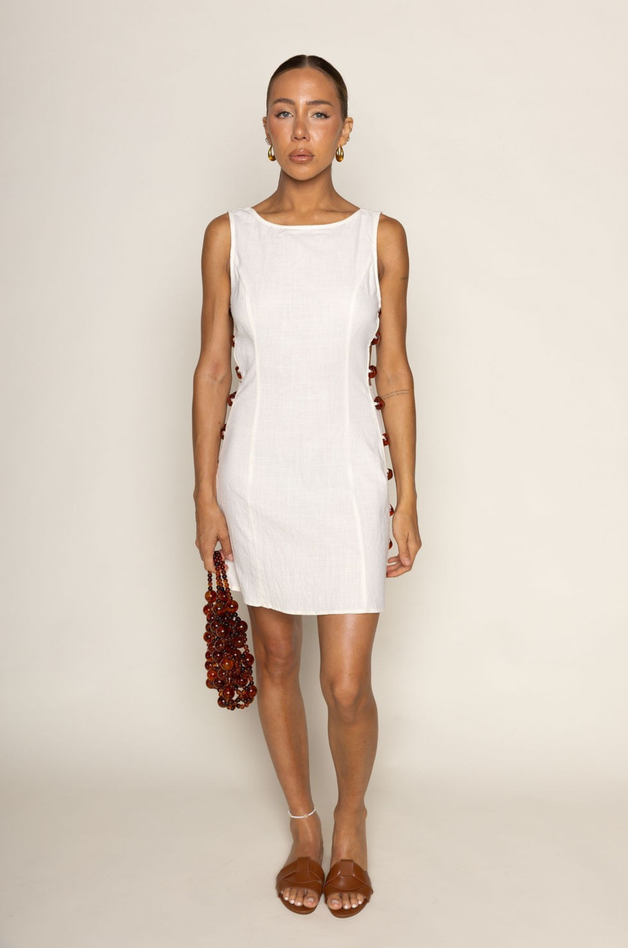 cream white Woven mini dress
Side bead detail
Side cut outs
Back zipper closure
Unlined
resort wear
resort mini dress