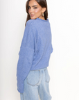 Fuzzy knit cardigan
Crewneck
Front button down closures
Long sleeves
Unlined
blue cardigan