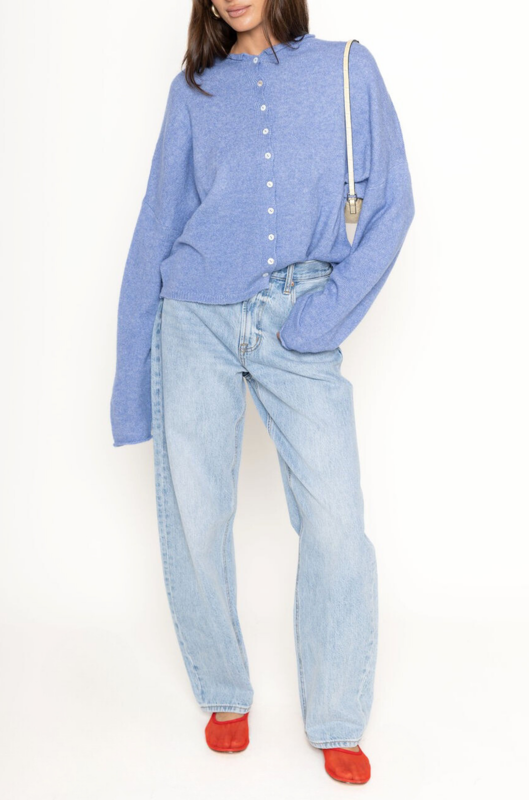 Fuzzy knit cardigan
Crewneck
Front button down closures
Long sleeves
Unlined
blue cardigan