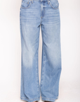 Low slung palazzo jeans
Button and zipper fly
Five pocket construction
Unlined
No stretch
Medium wash denim jeans