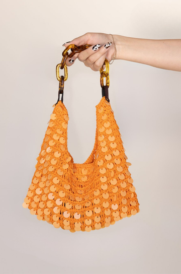 orange Sequin cotton mini purse
Inner lining
Magnetic clasp closure