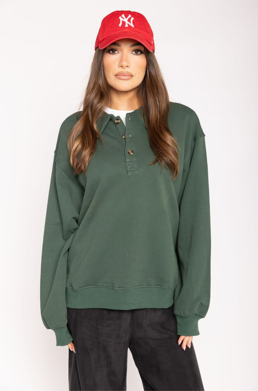 Knit sweater top
Collar neckline
Front button down closure
Unlined
hunter green sweater