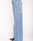 Low slung palazzo jeans
Button and zipper fly
Five pocket construction
Unlined
No stretch
Medium wash denim jeans