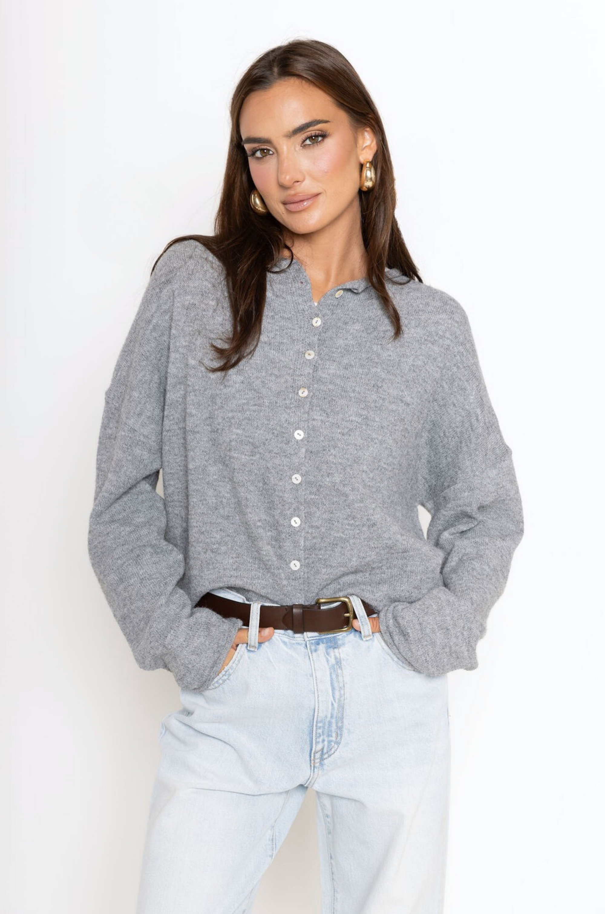 Fuzzy knit cardigan
Crewneck
Front button down closures
Long sleeves
Unlined
grey cardigan