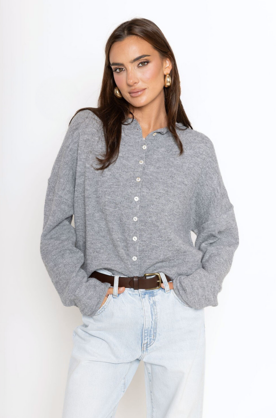 Fuzzy knit cardigan
Crewneck
Front button down closures
Long sleeves
Unlined
grey cardigan