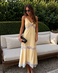 yellow Satin maxi dress
Lace detailing and trim
V neckline
Adjustable spaghetti strap
Unlined/Partially sheer