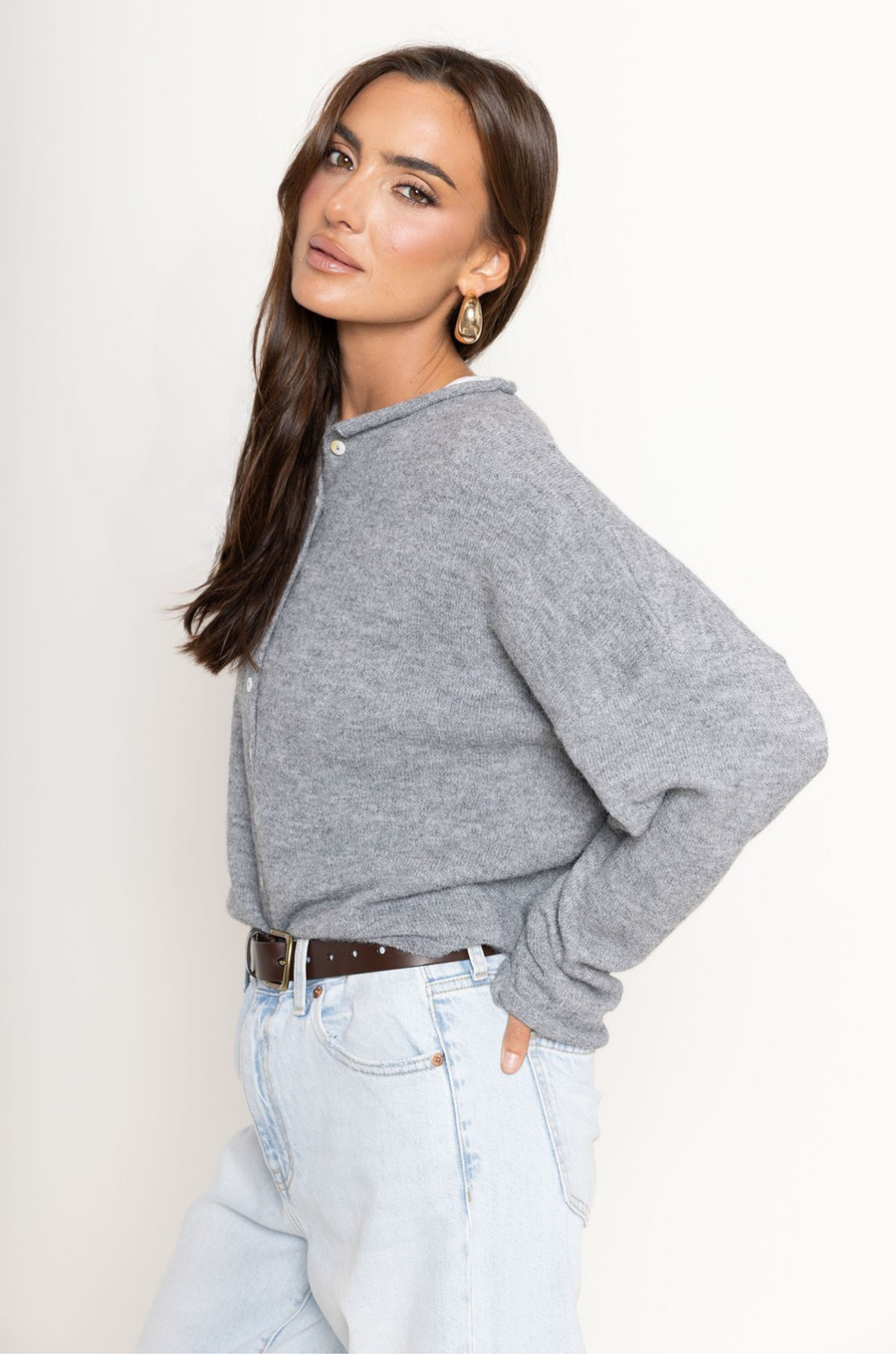 Fuzzy knit cardigan
Crewneck
Front button down closures
Long sleeves
Unlined
grey cardigan