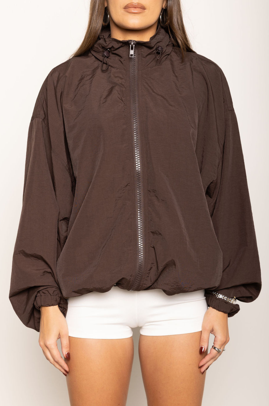 Windbreaker long sleeve jacket
Zip up closure
Rollable hood with zip closure
Adjustable drawstring hem and sleeve hem
Brown windbreaker jacket
fall outfit