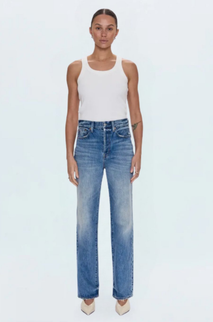 Super high rise straight leg jean
Button fly
Five pocket construction
No stretch
Waist: 25" / Waist: 25" / Rise: 11.5"
Cotton
Mid wash jeans
pistola denim