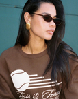 Thin, chic sunglasses
Sleek, minimal, and timelessly refined
Whether you're sipping espresso in the courtyard or hiding behind your shades poolside, they deliver quiet luxury with every glance.
Lightweight and flattering, they’re made for the girl who speaks volumes without saying a word.
thin brown sunglasss