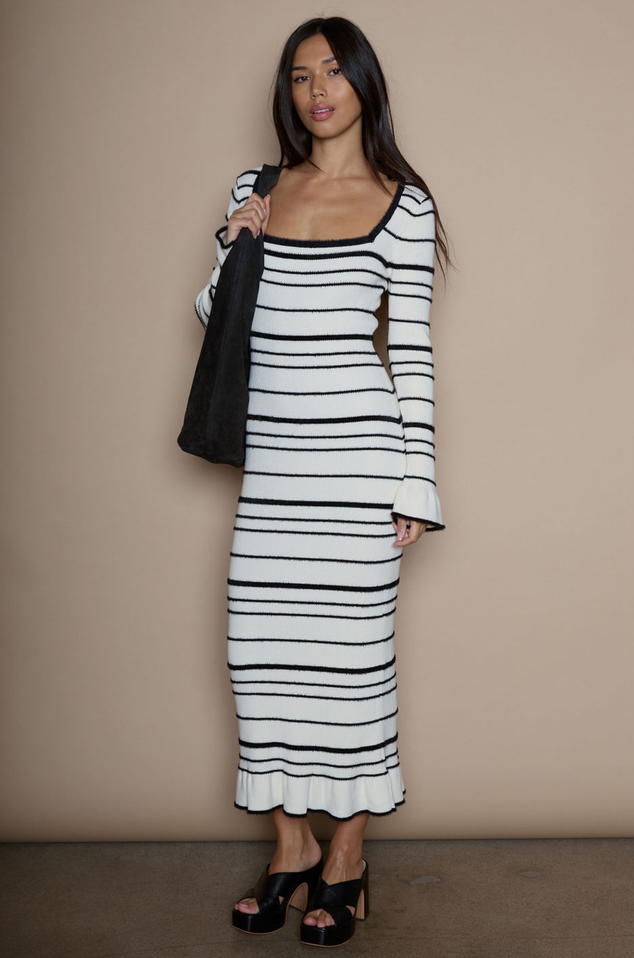 Faux fur striped ribbed knit maxi dress. Square neckline. Long sleeves. Unlined. fuzzy maxi dress. holiday look. holiday dress. white and black stripe dress