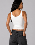 white Ribbed knit tank top
Elastic neckline
Unlined
Basic tank top
Rayon/Spandex