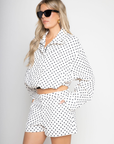 white snd black polka dot set
zara dupe
TOP
Polka dot collared jacket
Button zipper closure
Adjustable drawstring
Side pockets
Unlined
Length: 22.5"
Polyester

BOTTOMS
Polka dot high waisted shorts
Button zipper closure
Belt loops
Side pockets
Faux back pockets
Unlined
Length: 13" / Waist: 30" / Rise: 11.5"
Polyester