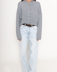 Fuzzy knit cardigan
Crewneck
Front button down closures
Long sleeves
Unlined
grey cardigan