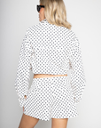 white snd black polka dot set
zara dupe
TOP
Polka dot collared jacket
Button zipper closure
Adjustable drawstring
Side pockets
Unlined
Length: 22.5"
Polyester

BOTTOMS
Polka dot high waisted shorts
Button zipper closure
Belt loops
Side pockets
Faux back pockets
Unlined
Length: 13" / Waist: 30" / Rise: 11.5"
Polyester
