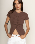 brown Knit button down short sleeve top
Button down closure
Open bottom hem line
Unlined