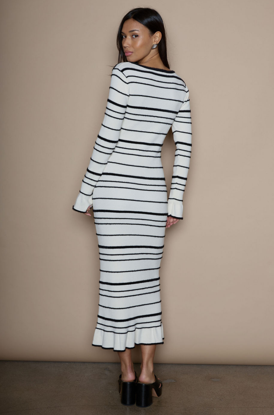 Faux fur striped ribbed knit maxi dress. Square neckline. Long sleeves. Unlined. fuzzy maxi dress. holiday look. holiday dress. white and black stripe dress