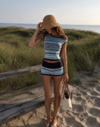 TOP
blue Striped knit off the shoulder top
Contrast trim
Unlined

BOTTOM
blue Striped knit mini shorts
Fold over waistband
Contrast trim
Elastic waistband
Unlined