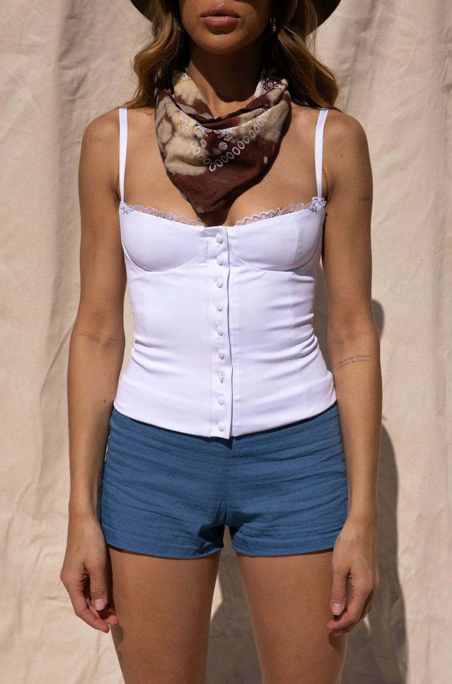 Knit crop top corset
Adjustable velvet straps
Tulle trimmed neckline
Front hook and eye closures
whit corset top
festival top outfit
stagecoach top outfit
country concert top outfit