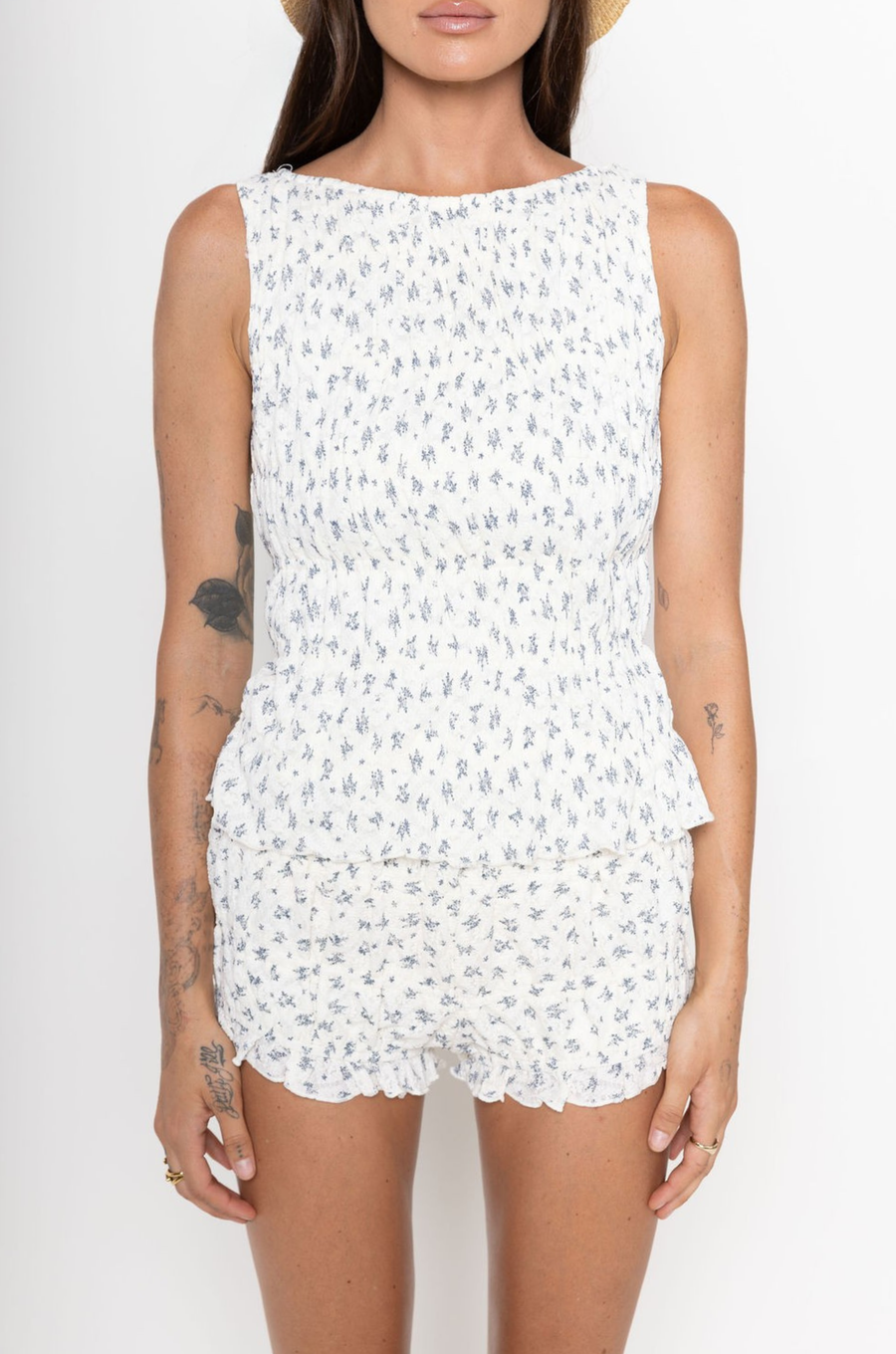 white and blue Floral mini shorts
Ruffled trim
Rouched throughout
Elastic waistband
Has stretch
Lined
dainty summer rouched shorts
white and blue floral tank top and shorts set