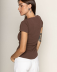 brown Knit button down short sleeve top
Button down closure
Open bottom hem line
Unlined