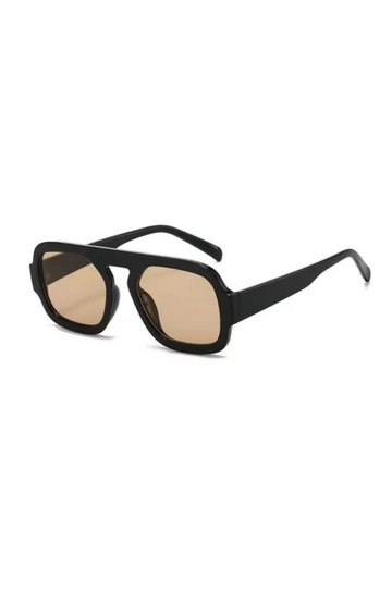 A modern take on a retro classic sunglasses.
Large frame.
Sleek black rims and softly tinted lenses for a lighter, cooler vibe.
Effortlessly stylish and endlessly versatile, they add instant edge to any look—whether you're keeping it casual or turning heads.
black frame sunglasses with brown lens
iris from love island