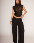 Black Sheer mock neck tank top
Asymmetrical hem
Side cinch
Unlined/Sheer
sheer going out top