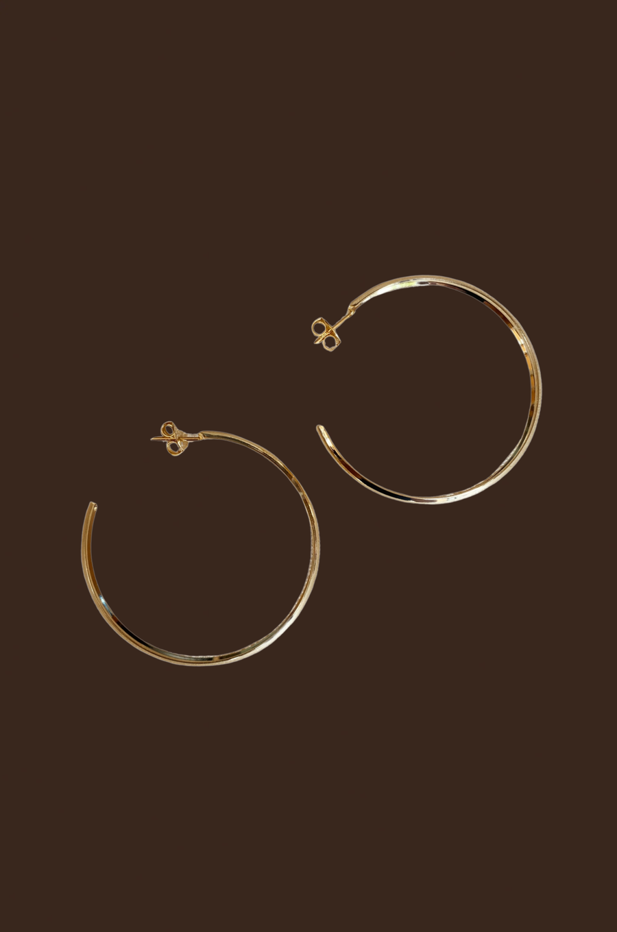 18k Gold filled 50mm hollow C-hoop earrings
gold hoop earrings