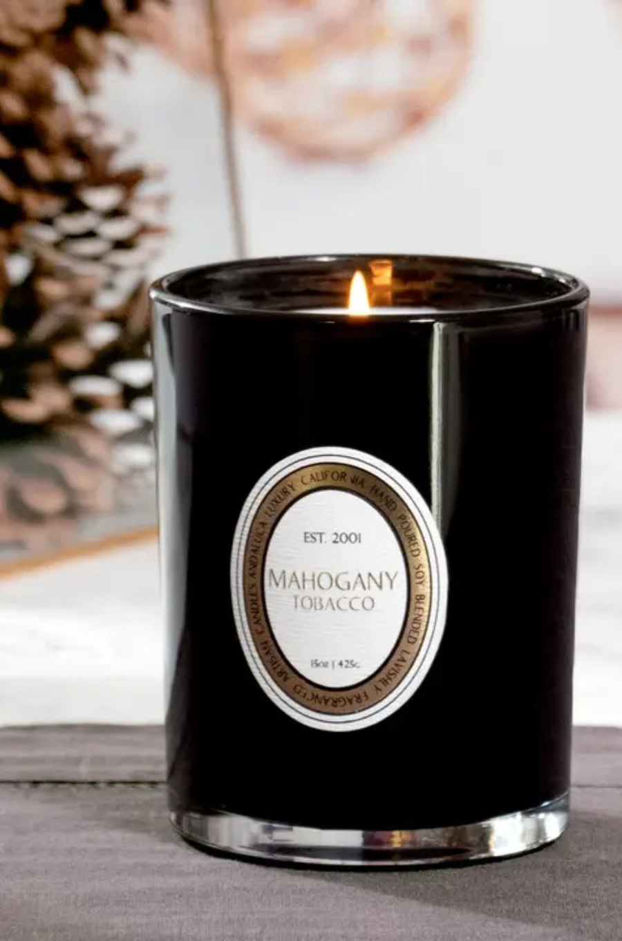 The beautiful fragrance notes of mahogany wood blend with the rustic and earthy notes of tobacco
Fragrance notes:
Top: tobacco, vanilla
Middle: teakwood, birch, soft cream
Base: amber, oak leaves, cashmere
Natural soy blend wax
15 ounces
40+ hour burn