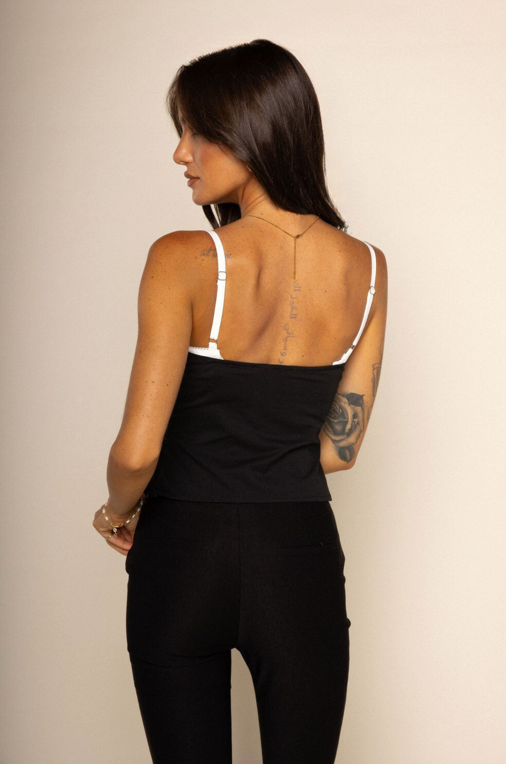 Peek-A-Boo corset tank top
Ruffle trim
Faux front buttons
Adjustable straps
Bra hook and eye closure
Side zipper closure
black and white corset top
going out tank top