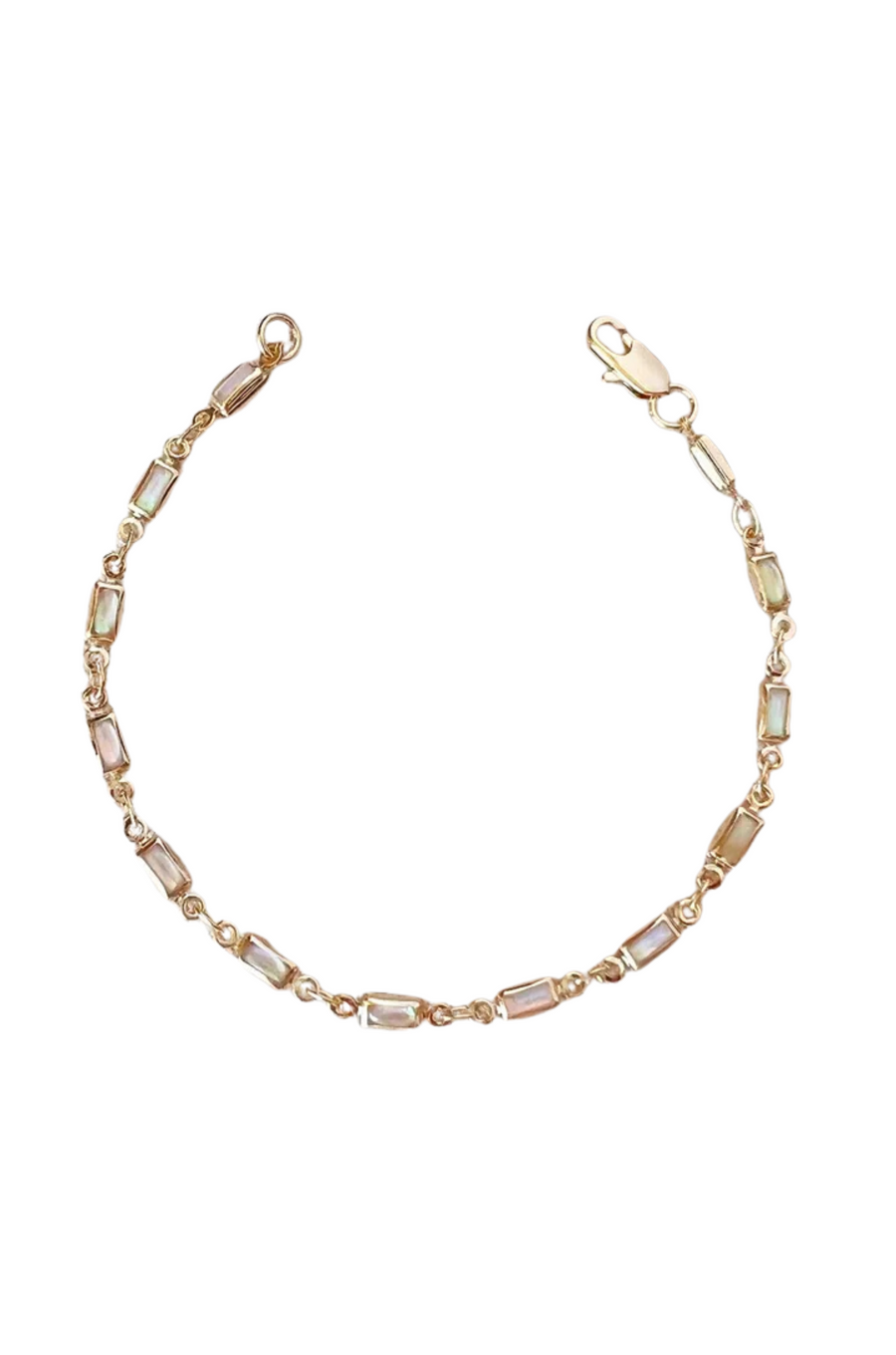 Delicate 18k Gold Filled Opal Bracelet
Lab Made Opals
Hypoallergenic jewelry
Nickel Free
Water resistant
Length: 7"