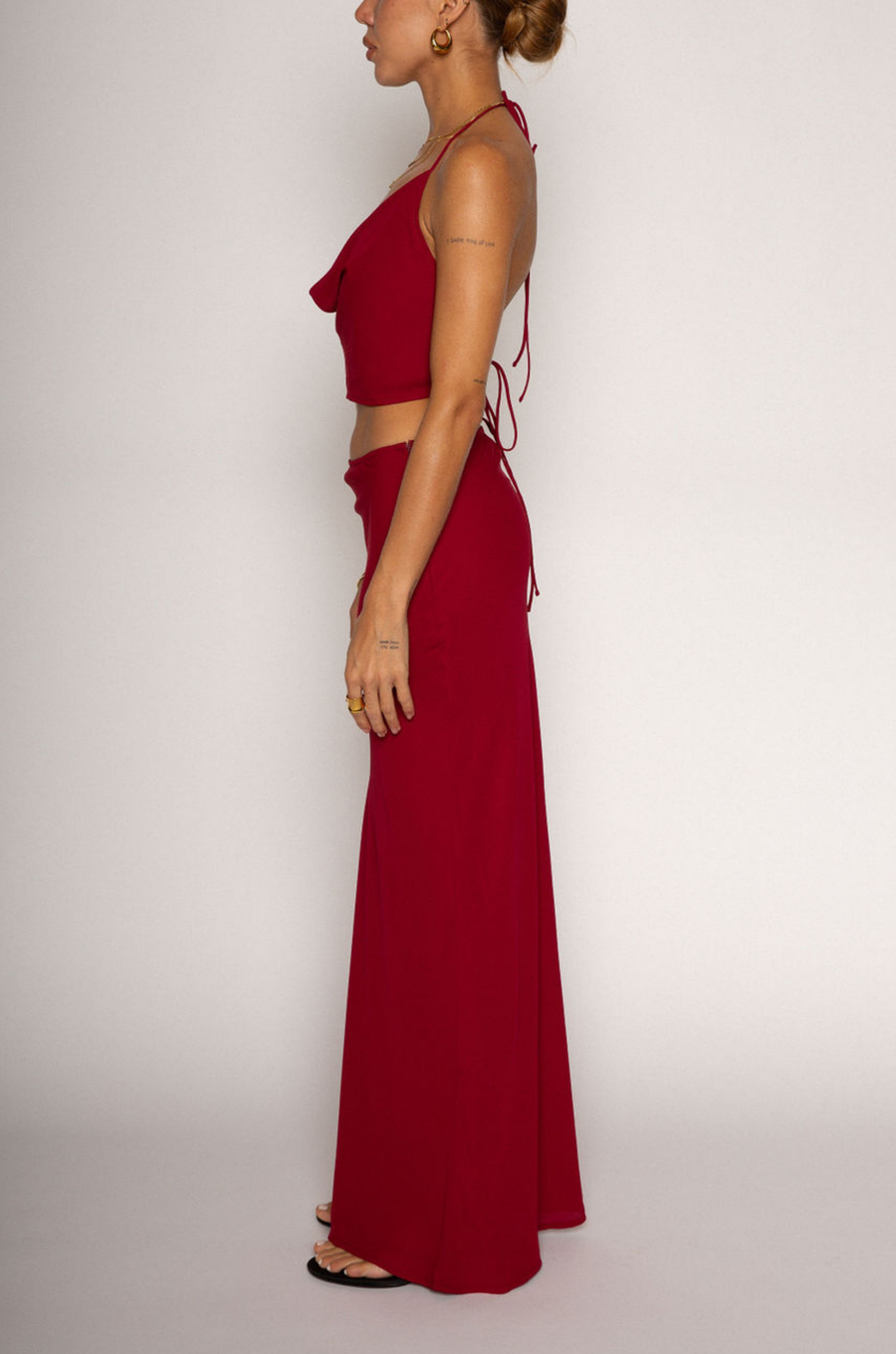 Halter crop top. Adjustable neck and back tie strap. Cowl neck. Partially lined. Maxi skirt. Hidden side zipper. Lined. red skirt set. cherry red skirt set. going out set. nice dinner set. summer outfit. spring outfit.
