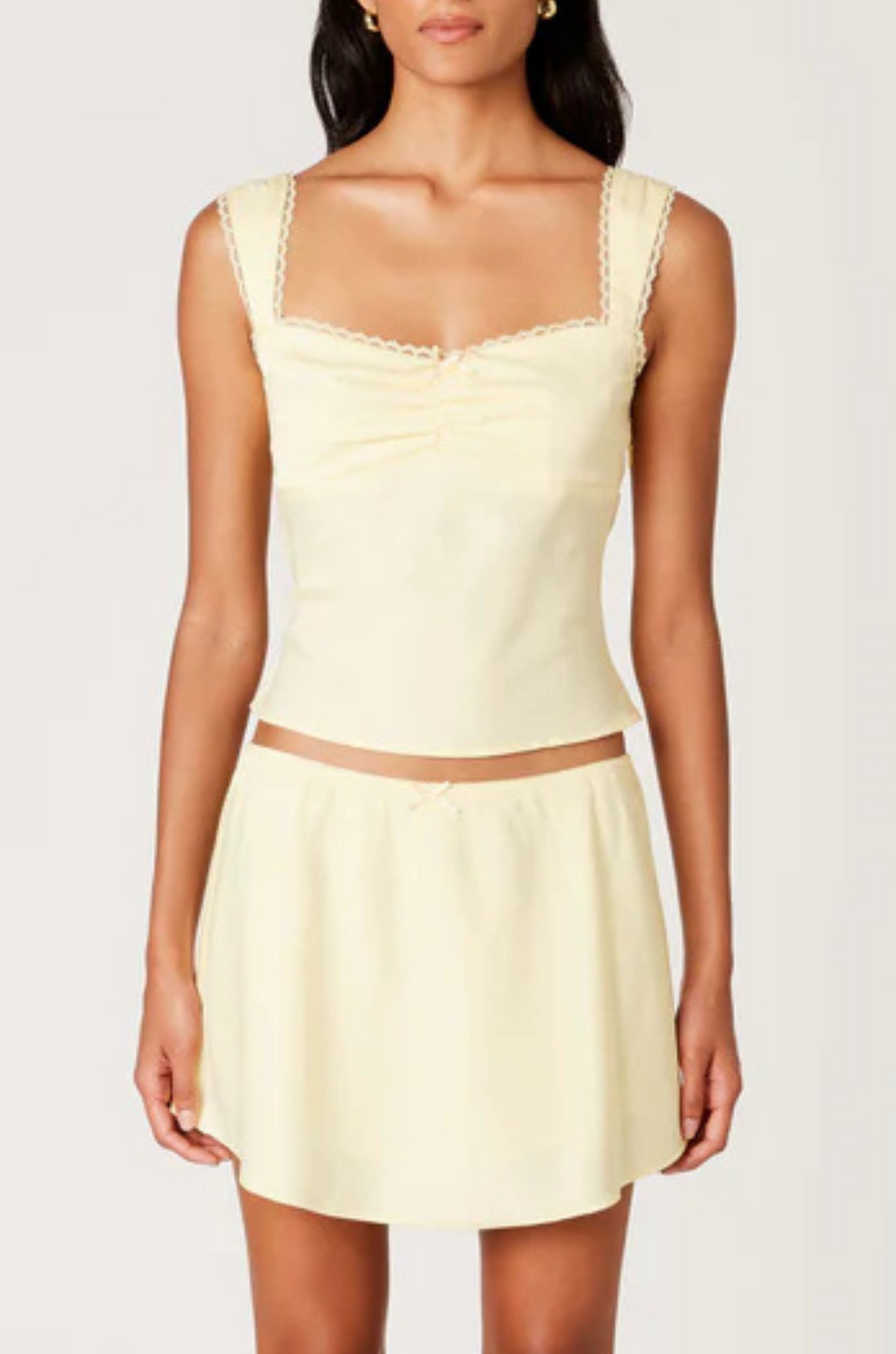 yellow satin tank top
Sweetheart neckline with ruched bust
Wide fixed shoulder straps with lace trim
Adjustable tie-back detail
Fitted silhouette
Unlined
summer tank top
spring tank top