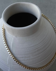Square chainlink gold necklace. Adjustable lobster clasp closure.