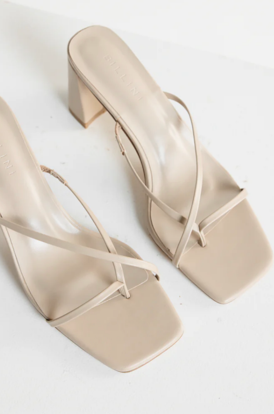 cream stone Cross over strap heels
Squared toe
Block heel