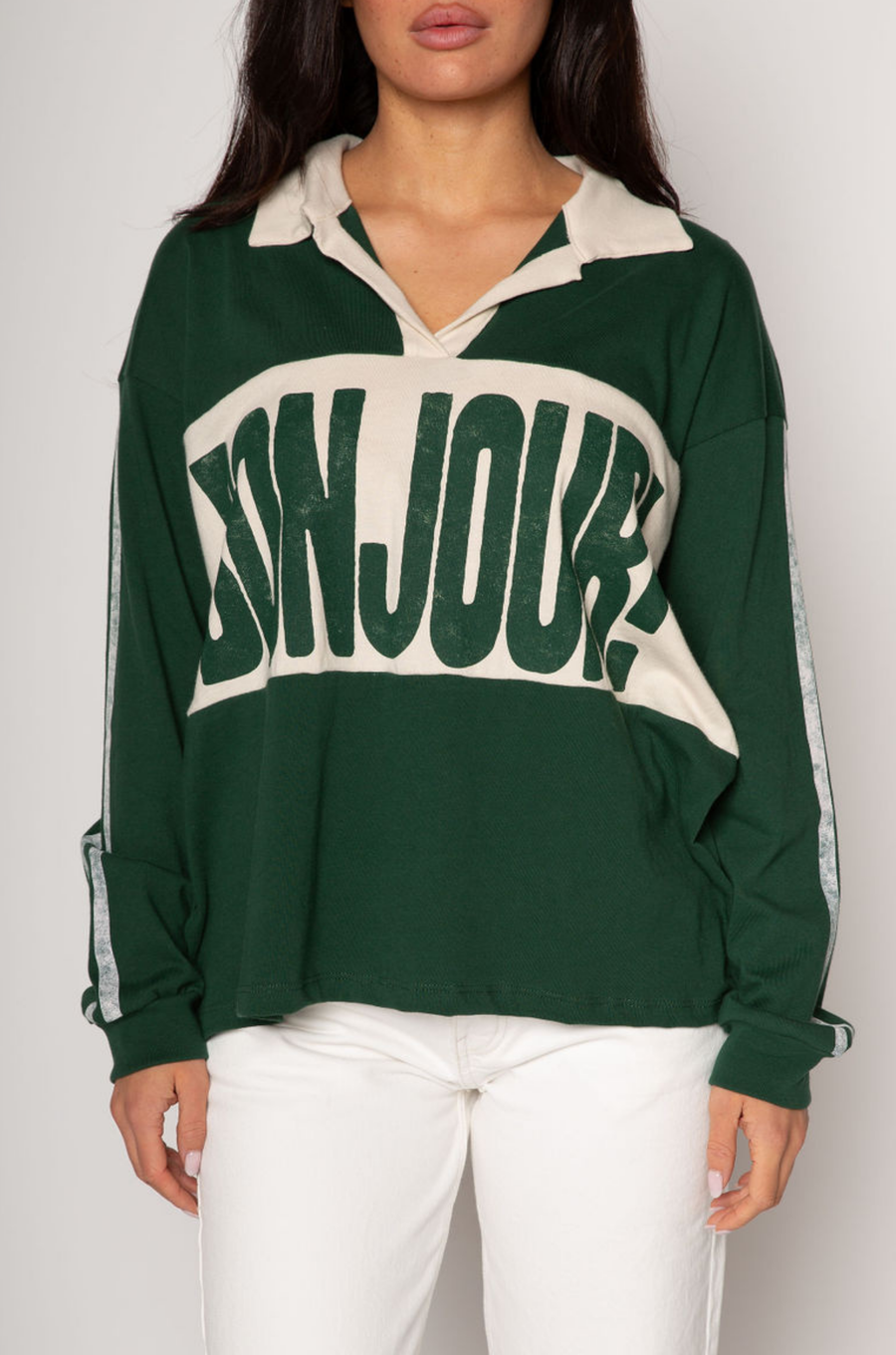 Graphic printed knit top. Collar neckline. Long sleeves. Unlined. green graphic long sleeve tee. bonjour tee