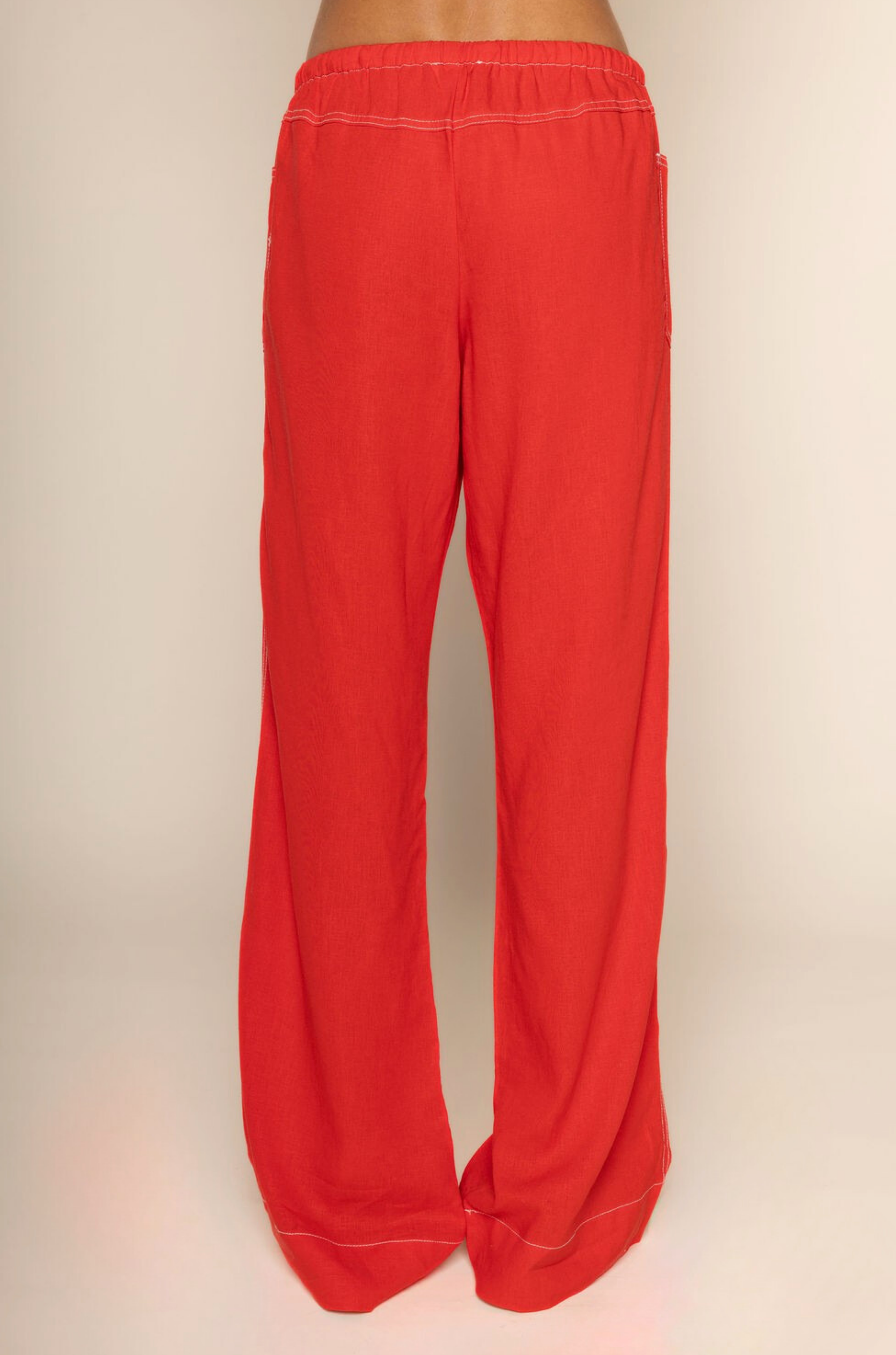 red Linen pants
Elastic adjustable drawstring waistband
White contrast stitching
2 front pockets
Unlined
red cover up pants
swim cover up
fourth of july swim cover up