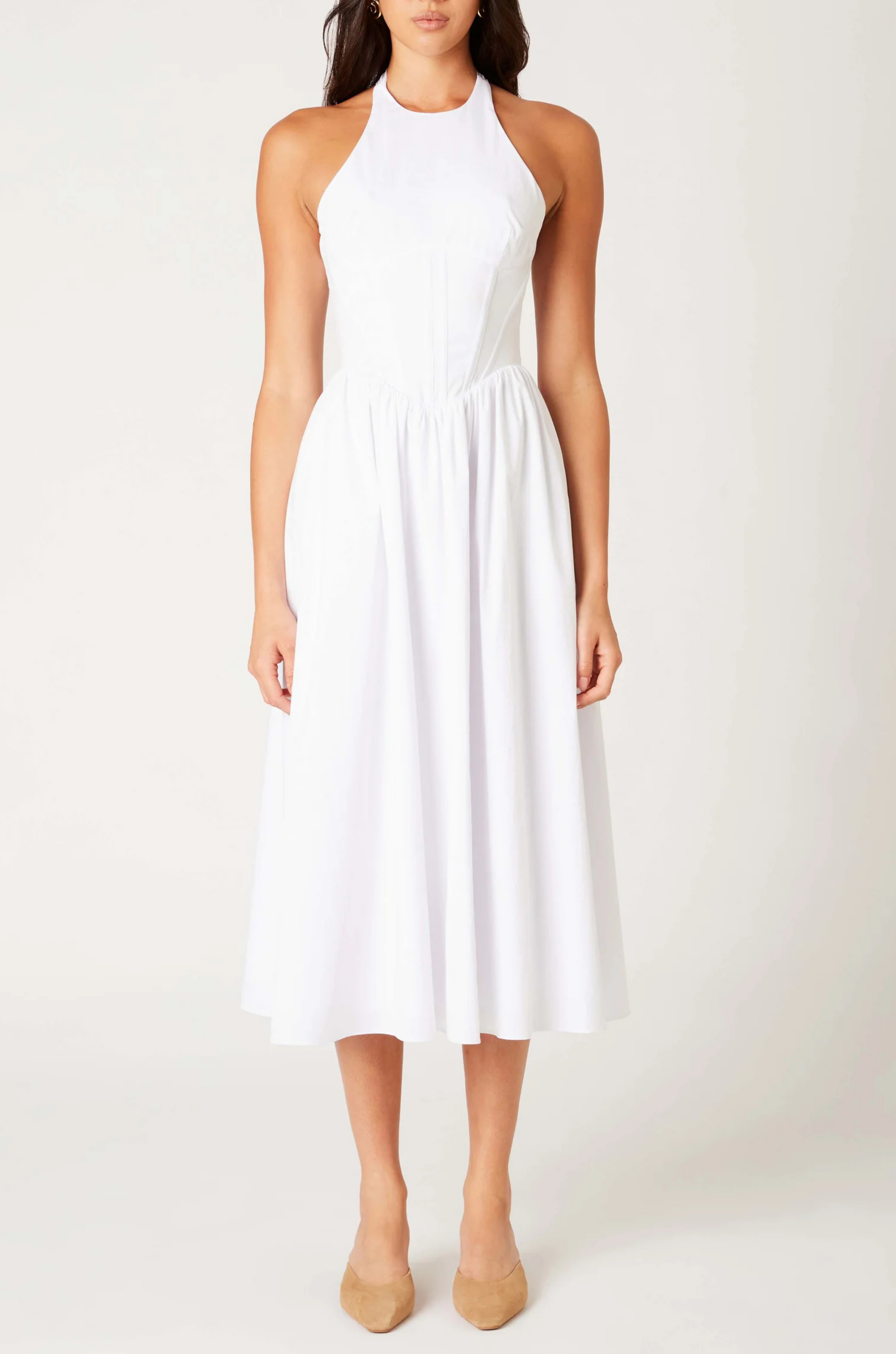 Woven midi dress
Adjustable halter neckline
Boning in bodice
Side pockets
Elastic back neckline
Back hook and eye and zipper closures
Fully lined
white midi dress
bridal dress
bridal shower dress